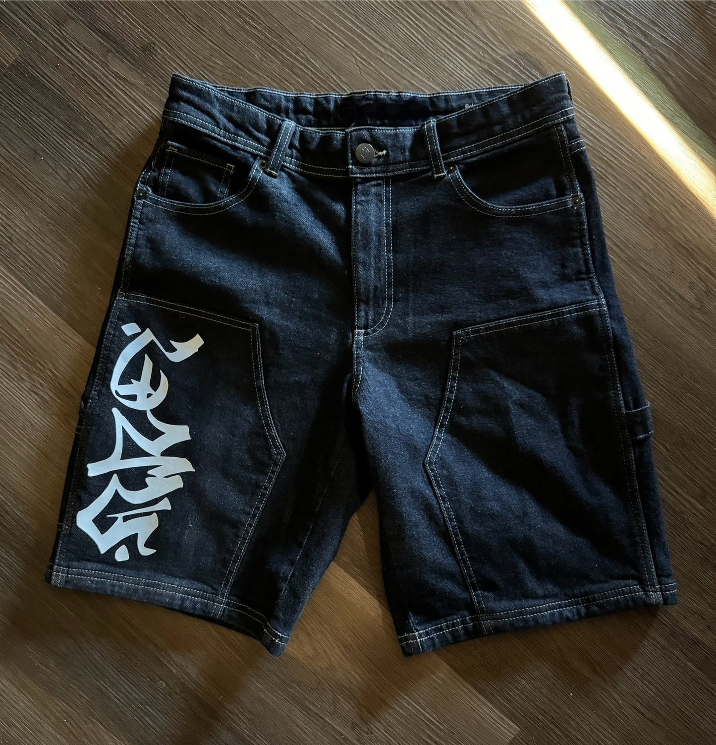 Graffiti denim shorts